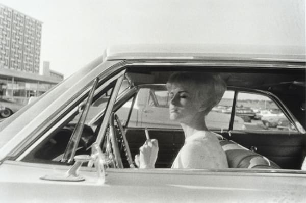 William Eggleston, Untitled, (woman with cigarette in car), 1960-1972