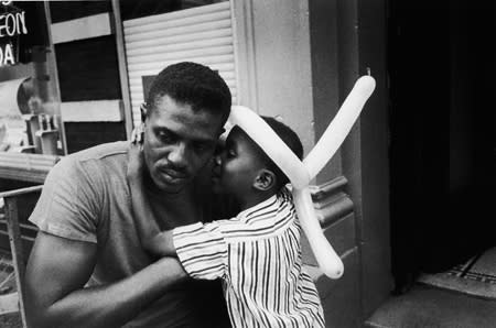 Bruce Davidson, Untitled [child with balloon hat, Dad], New York City, A Time of Change, 1961