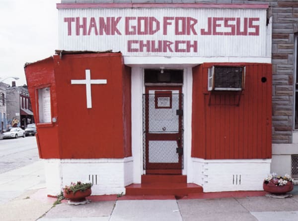 Camilo Jose Vergara, At Thank God for Jesus Church, a sign reads, Our Mission is to Win the Lost to Christ, North Bond Street, Baltimore, 2002