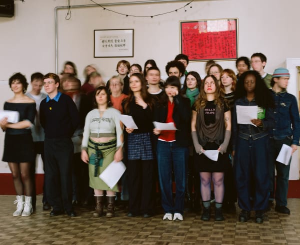 Amy Strzoda Photo of the choir on the 18th of February at Garnethill Multicultural Centre, 2024 Paper on plywood board 230 x 180 cm