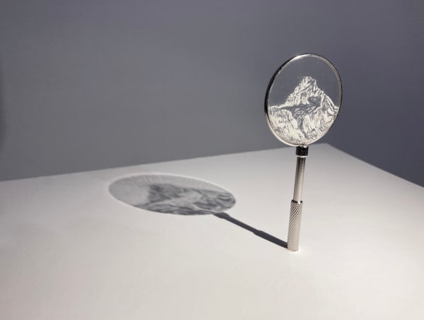Sarah Casey Ice Watch (Bietschhorn), 2025 Glacial flour on glass Drawing: 4 x 4 cm Mounted in lens holder: 10 x 4 cm Plinth: 110 x 35 x 35 cm