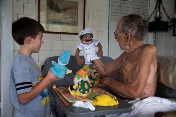 Denise DeLaunay-Wood Dad & Caesar Playing with Puppets, 2020 Photographic print - Dibond lustre 42 x 30 cm