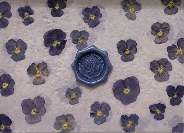 Catriona Clark Curious Flowers: Violets, 2024 Sealing wax with Pressed Rose Flowers on Hand-made Paper 21.5 cm x 27 cm x 4.5 cm