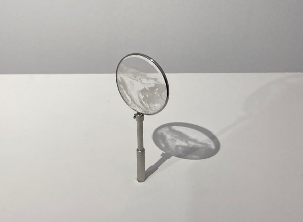 Sarah Casey Ice Watch (Chilchligletcher), 2025 Glacial flour on glass Drawing: 4 x 4 cm Mounted in lens holder: 10 x 4 cm Plinth: 110 x 35 x 35 cm