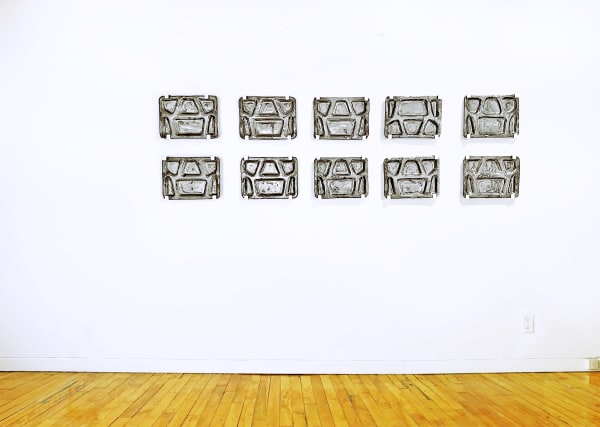 Vick Quezada Stainless Remains, 2023 Ceramic, mid fire clay with a palladium glaze 10 x 13.5 x 1 in each 25.4 x 34.3 x 2.5 cm each Total Installation: 25 in x 84 in