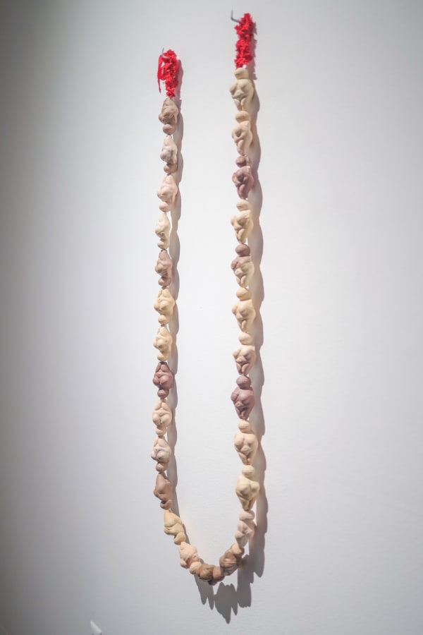 Jennifer Ling Datchuk Silent Sisterhood, 2021 Wire, silk ribbon, slip cast Laguna porcelain for dolls 45 x 12 x 3 in 114.3 x 30.5 x 7.6 cm