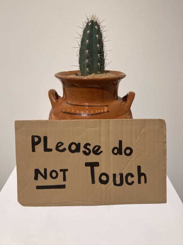 Alejandro Diaz Please Do Not Touch, 2009 Mexican clay pot, acrylic paint on cast resin sign, live cactus Pot with plant: 10 x 10 x 19 in, 25.4 x 25.4 x 48.26 cm Pedestal: 12x 12 x 48 in, 30.48 x 30.48 x 121.92 cm Edition 1 of 3 plus 2 AP