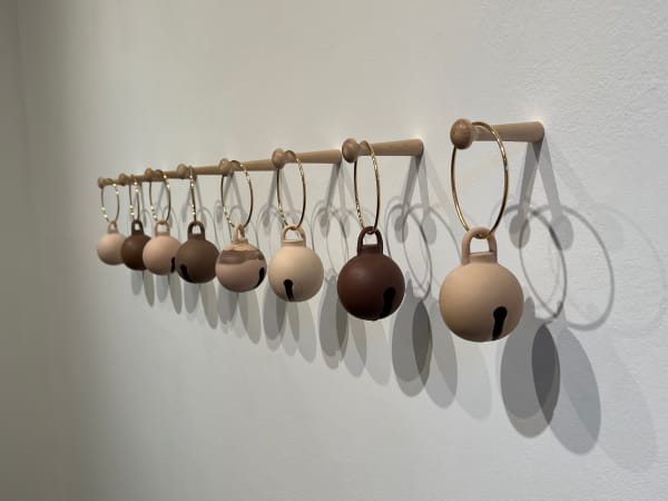 Jennifer Ling Datchuk Hear Us Coming, 2023 Laguna Co. porcelain doll clay, metal ring, wood 3 x 3 x 3.5 in 7.6 x 7.6 x 8.9 cm Edition of 5