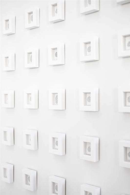 Clare Kim Untitled installation, 2011 Handwritten text in ink on paper, installation of 196 framed pieces, dimensions variable (installed at Auckland Art Fair at 3000mm x 2700mm)