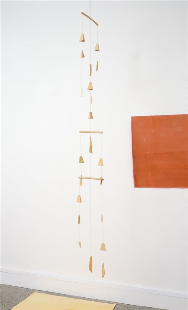 Mia Morris I've been thinking about the sun lately: Wind Chimes, 2022 ceramic, steel sinkers, cotton cord 240.0 x 38.0 x 38.0 cm