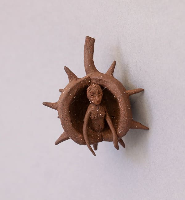 Manaia Thomas-Bloom Horse Chestnut Seedpod Amulet, 2025 Ceramic, wall mountable 42 x 38 cm