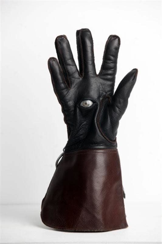 Josephine Cachemaille Justin, 2013 Pyrite, paintbrushes, glass eye, leather glove, latex glove, chain, dye, paint, metal rod, glue, wood, cork, wire 355 x 165 x 112 mm