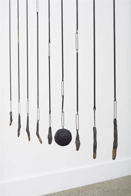 Josephine Cachemaille Detector (curtain), 2014 Steel, bronze, found rubber stress ball 220.0 x 130.0 x 10.0 cm