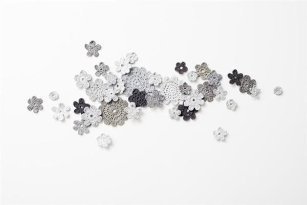 Wendy Kawabata Grow in Light (small installation), 2015 Crochet flowers, acrylic 43.0 x 104.0 cm