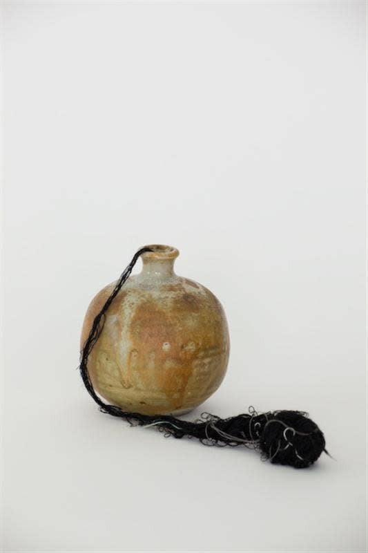 Josephine Cachemaille Therapy talisman, 2009 thread, nail, polymer clay and found ceramic vessel 100 x 90 x 90 mm