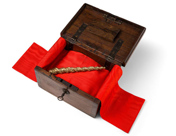 Emma Kathleen Hepburn Ferrer (Italy/US) Reliquary, 2025 Brass sculpture of juvenile unicorn horn, placed in 18th century walnut alms box, liturgical silk Unique 7 7/8 x 9 7/8 x 6 3/4 in 20 x 25 x 17 cm