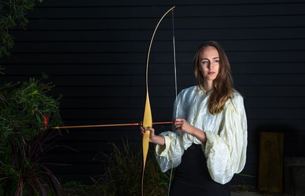 Claire Lambe, Untitled Film Still (Emily with archery bow), 2018