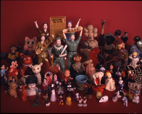 Liliana Porter, Please Don't Move! (with red background), 2002