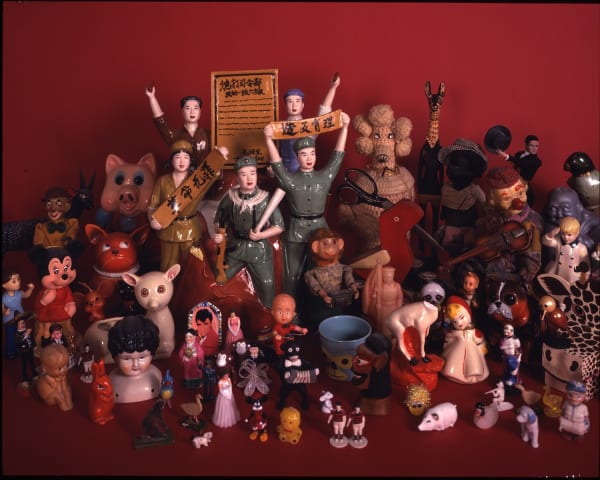 Liliana Porter Please Don't Move! (with red background), 2002 Cibachrome print 31.25 x 40.5 inches