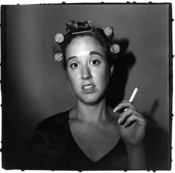 A young man in curlers at home on West 20th (You, Me & Diane)