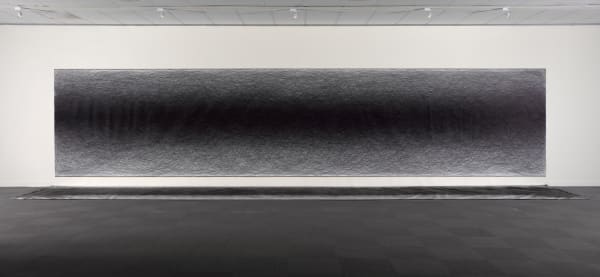 Shi Jin-Hua A 100km Walk, 2012-2017 151 pencils on Wall Canvas and Ground Canvas, shoes, notebook, digital photograph, single-channel video (color, with audio), and document. Dimensions variable, 218 x 1007cm (Wall Canvas), 156 x 1002.5cm (Ground Canvas), 41.1 x 33.5 x 1.5 cm (Mileage Logbook), 11 x 11 x 32.2 cm (Pencil shavings in a glass jar), 66.5 x 47cm x 24 pcs (Process images), 4′ 30″, 42 x 29.7 cm (Document).