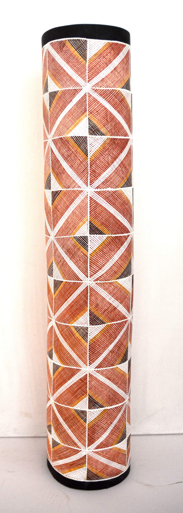 Obed Namirrkki Kunkurra (The Spiralling Wind), 2024 pigment and fixative on wood 111 x 22 x 22 cm