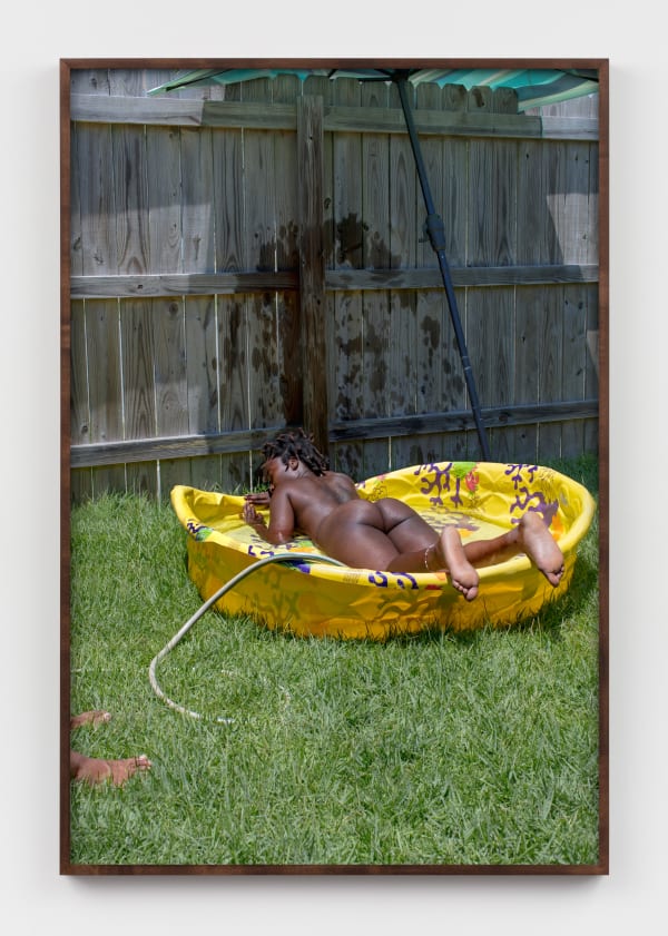 Elliott Jerome Brown Jr., Sweeping the bricks to the center. The door is too heavy to stay open on its own, 2019