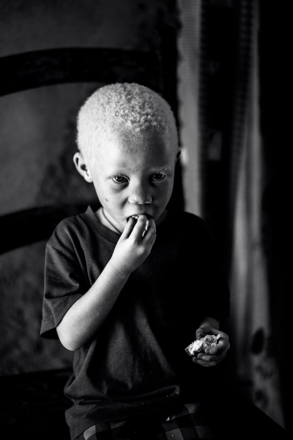 Alice Kayibanda, Life in the shadow- Fiona is eating some bread, 2020