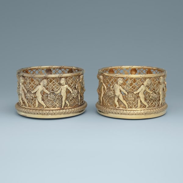 Paul Storr, An Exceptional Pair of English Regency Silver-Gilt Wine Coasters, 1812
