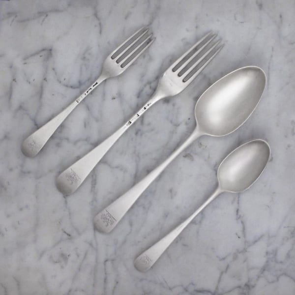 Thomas Chawner, An Early George III Antique English Silver Old English Pattern Flatware Service for Twelve, 1776