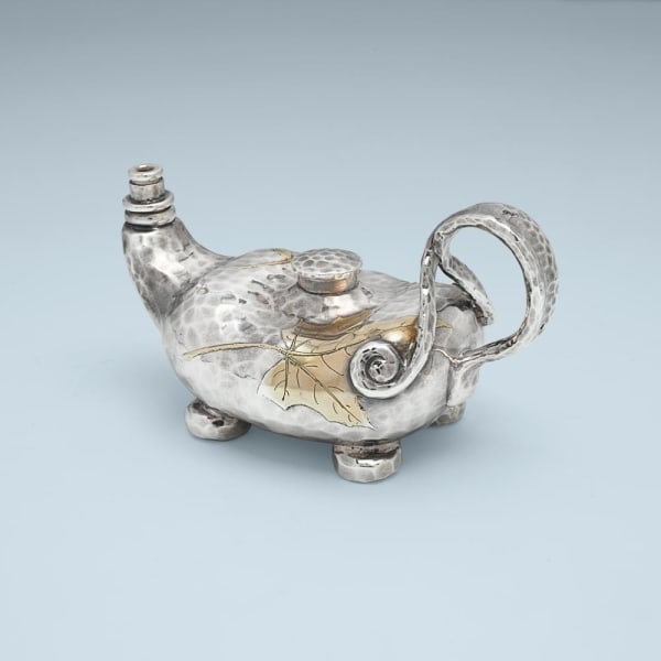 Tiffany & Co., An American “Japanesque” Silver and Silver-Gilt Cigar Lighter, c. 1880