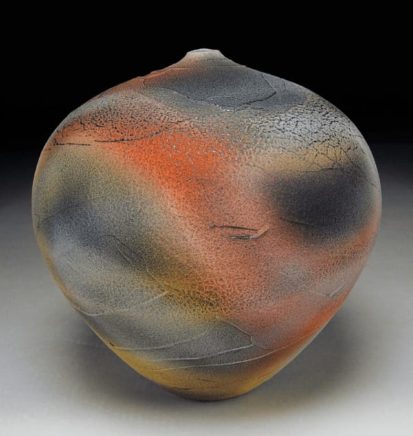 earthenware vessel with swirls of color by potter Nicholas Bernard