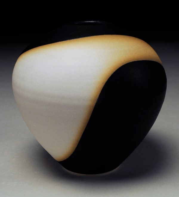 Black/White Vessel, a porcelain sculpture by slate gray gallery artist Nicholas Bernard