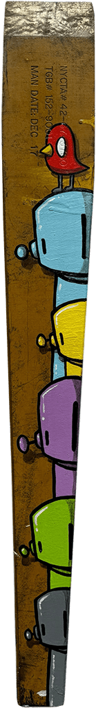 wooden beam with a grey, green, purple, yellow, and blue robots drawn stacked on top of each other with a red bird at the very top