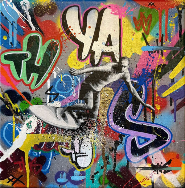 black and white surfing through colorful graffiti text and designs