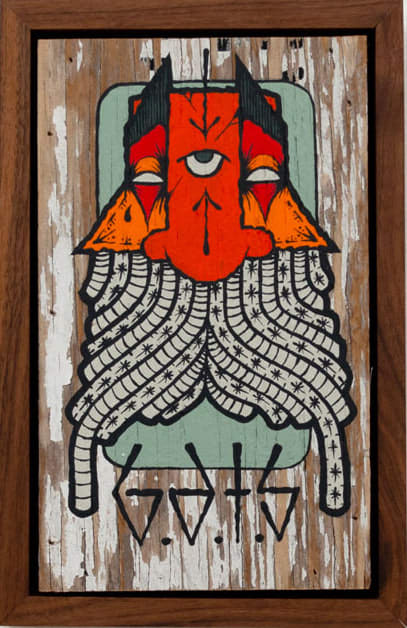 GATS character with long white tentacles and a red and orange beard on a wooden background