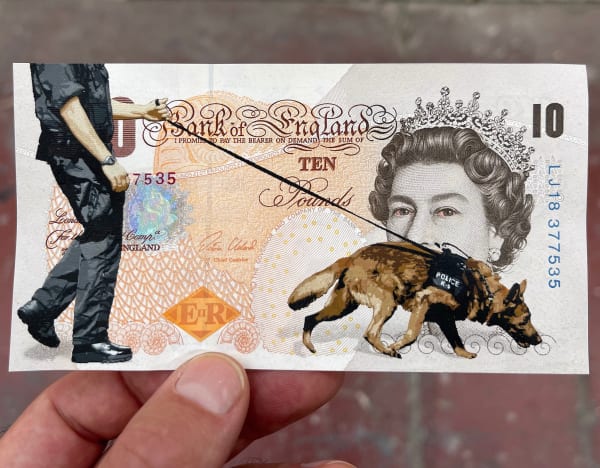man walking a drug sniff dog