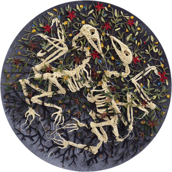 crocheted thread circular sculpture depicting animal fossils