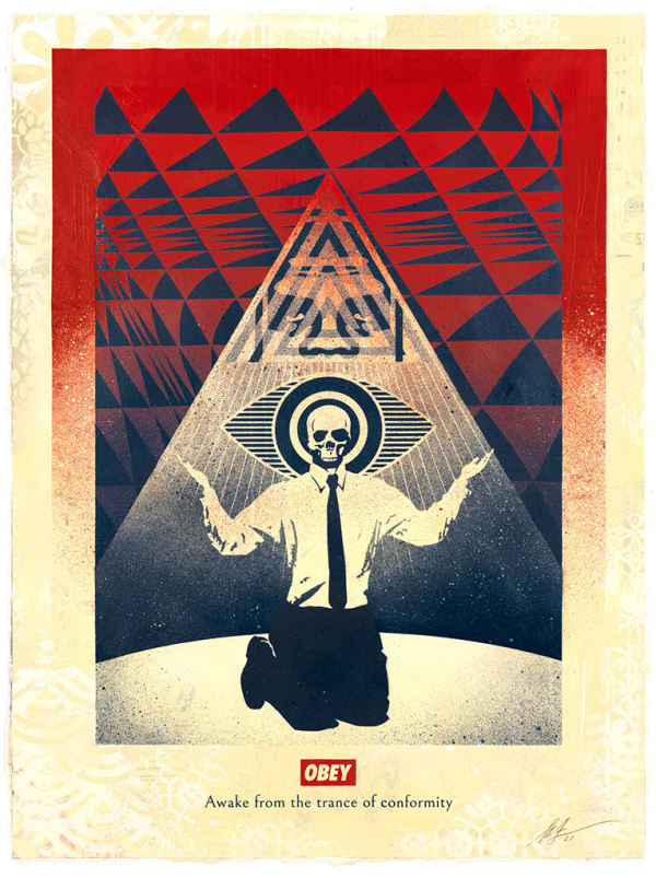 man with a skeleton head kneeling with his arms out with a pyramid behind him and an eye shape around his head. The OBEY logo is on the bottom with text below it