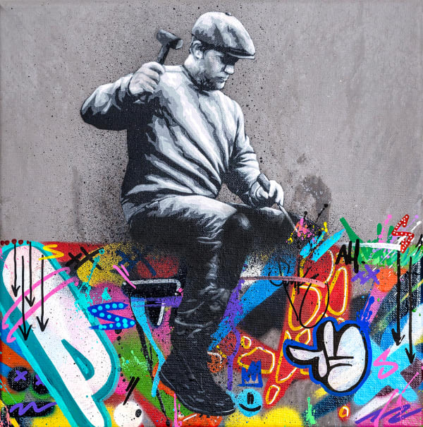 black and white quarry worker sitting on top of a graffiti design