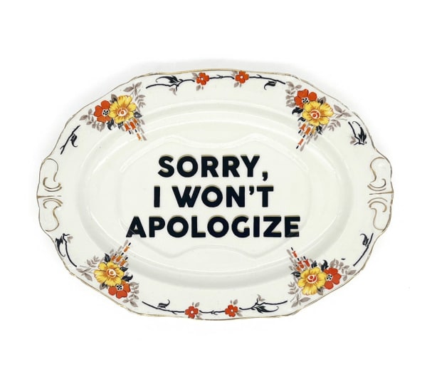 ceramic plates with words painted on them