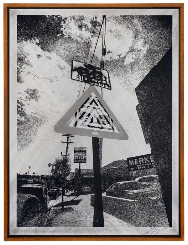 black and white textured image of a street sign