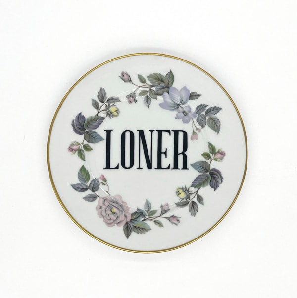 ceramic plates with words painted on them