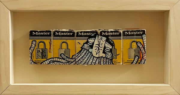 five padlock boxes pushed together and painted with GATS mask