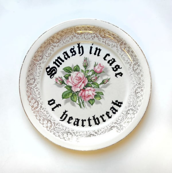 Plate reading "Smash In Case Of Heartbreak"