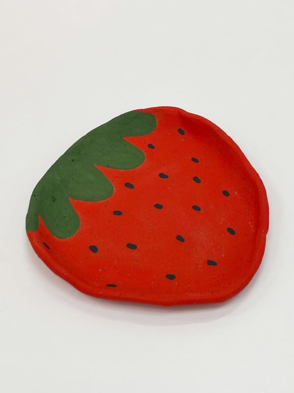 Jackie Brown ceramic plate of a red strawberry