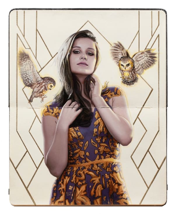 Painting of a woman in a patterned yellow and purple dress with two owls flying near her head and geometric shapes in the background