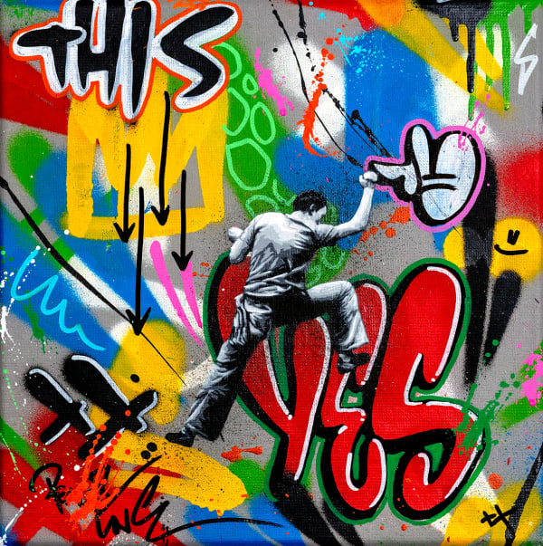 black and white figure climbing over graffiti text