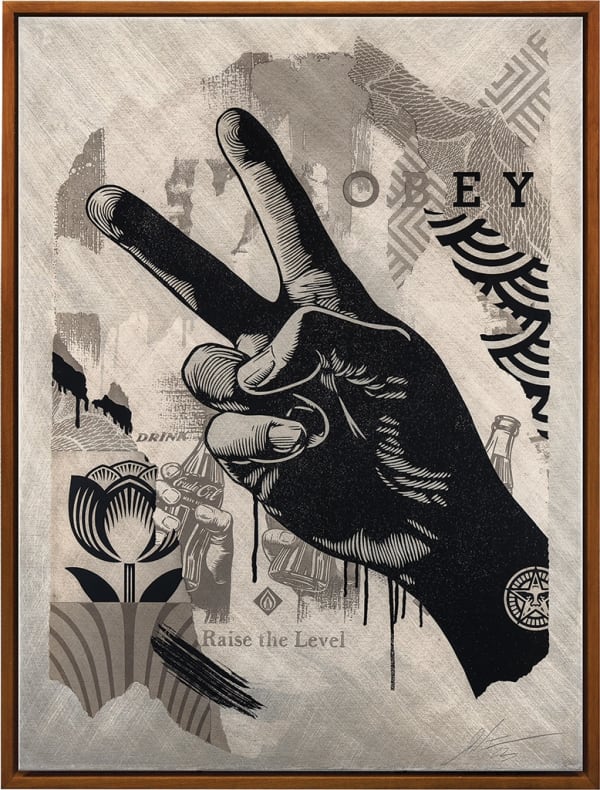 hand with a peace sign on the patterned collage background in grey scale