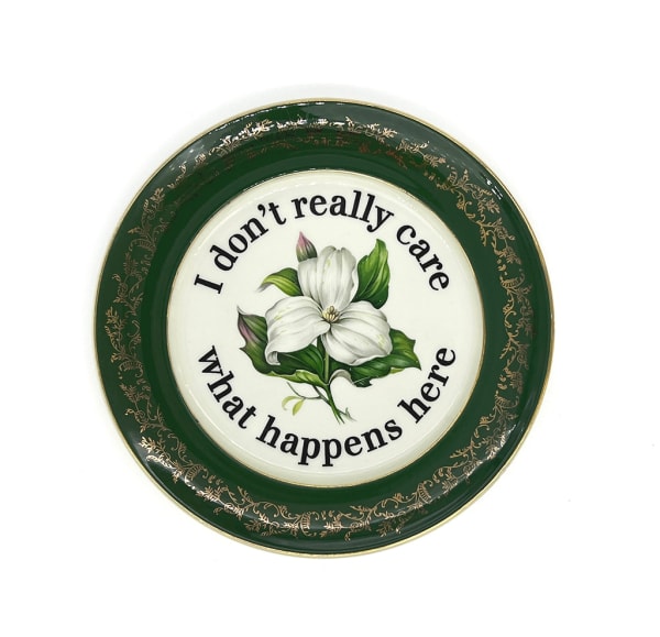 ceramic plates with words painted on them